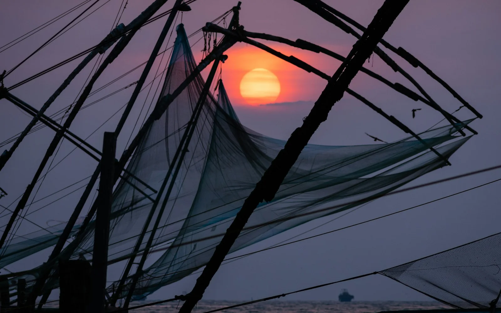 Chinese fishing nets at sunset in Fort Kochi