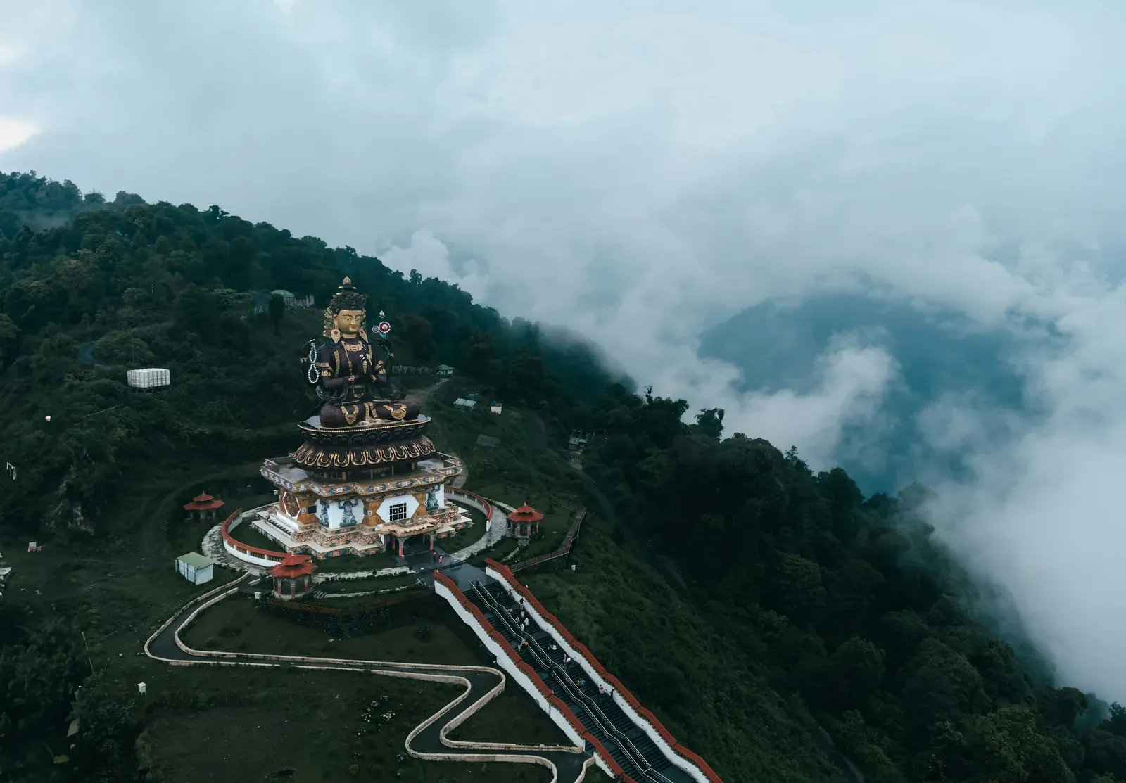 Sky Walk and Chenrezig statue above the forest in Pelling
